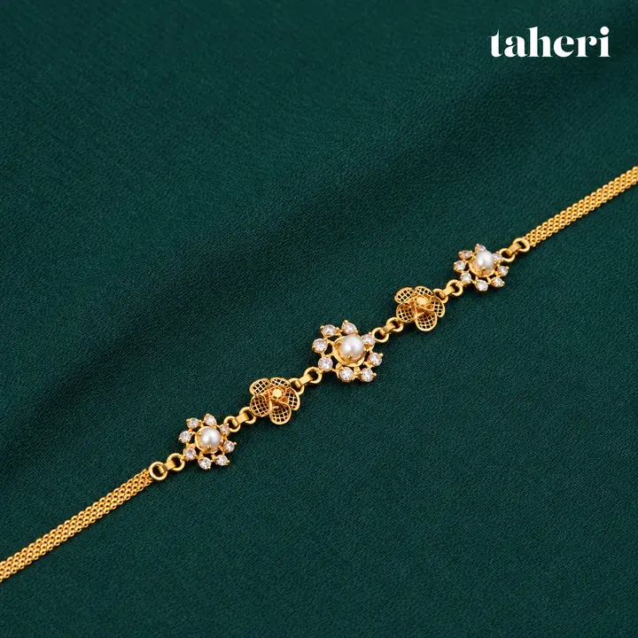 Pearl Filigree Flower Bracelet by TAHERI