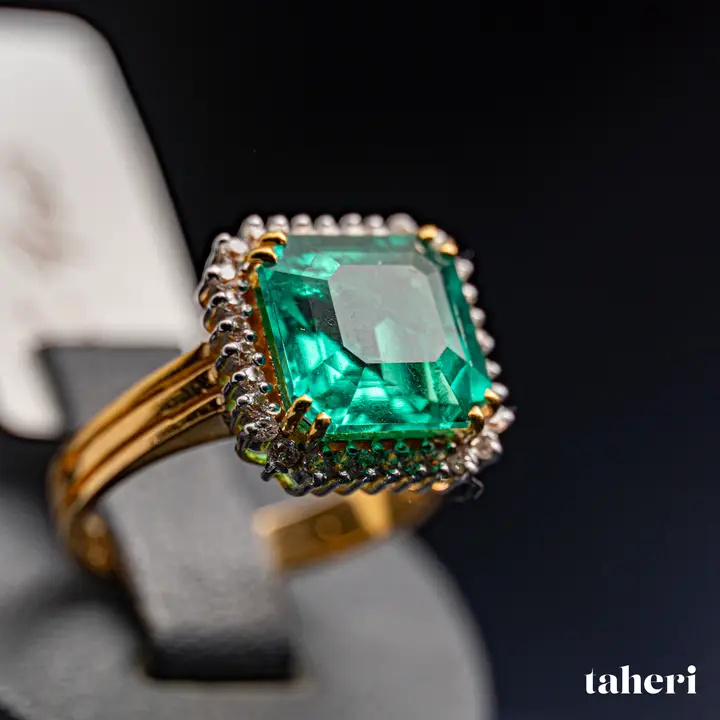 Two-Tone Ring with Emerald design 362 by TAHERI