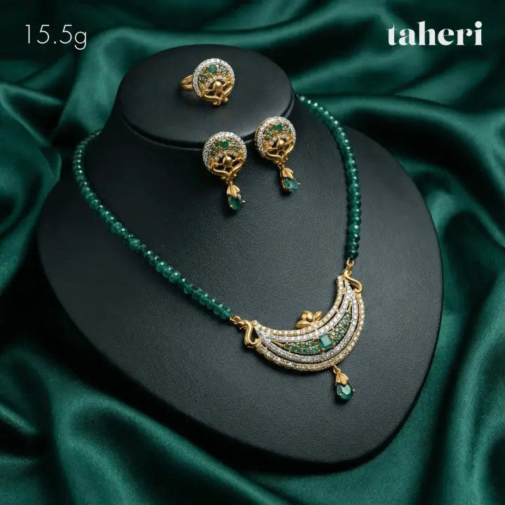 21k Yellow Gold String Set with Emerald design 33 by TAHERI